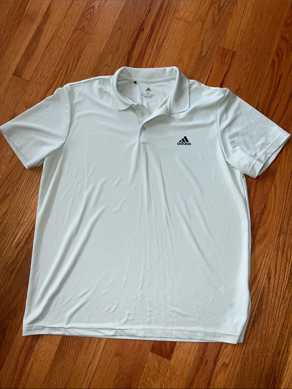 adidas Men’s light green Polo with Black Logo